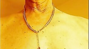 nude wearing chains bracelet and rings