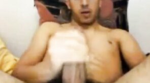 Str8 Guy Strokes His Big Cock and Shoots a Huge Load on Webcam