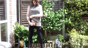 Thigh-booted Crossdresser Strokes Outdoors