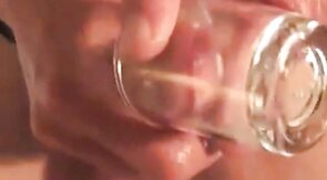 Twink's Cock Harness Fun with a Shot Glass Twist