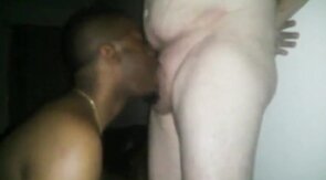 Pierced Tongue Black Guy Sucks a Big White Cock