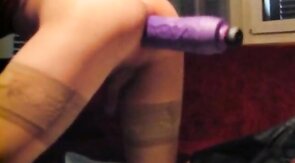 Crossdresser Takes on a Huge Dildo