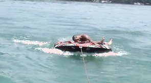 Black males are sucking in the 69 pose on the beach