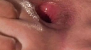 Policeman is nailing an arrested guy right on the table