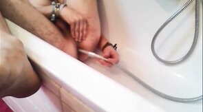 Twink Uses Shower Head for Enema and Masturbates