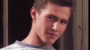 Young man with cute face swallows a dick in the bedroom