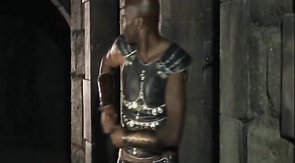 Black knight is wanking his massive dark sausage