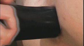 Good boyfriend is stretching his mate's anus with a dildo