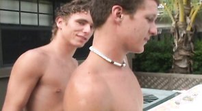 Two youngsters are sucking cocks outdoors