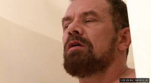 Brutal bearded daddy is masturbating in the shower