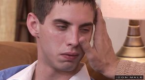Crying young man is getting seduced by Icon Male