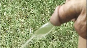 Interracial partners are pissing on a submissive slave