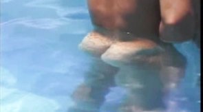 Muscled tanned man is giving a passionate outdoor blowjob