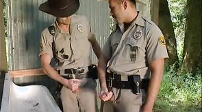 Sweet sheriff is handling two hard boners