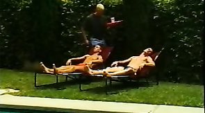 Two relaxed men are getting a double blowjob!