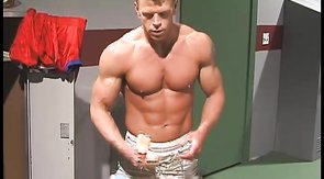 Hunk sticks a big rubber dick in the anal hole