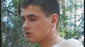 Sexy naked twink is sucking in the forest