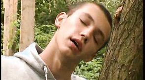 Dicksucker is giving his mate a nice blowjob in the forest