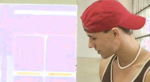 Sporty performer is giving a blowjob down on the knees