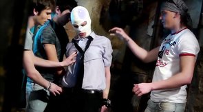 Masked sex doll is sucking two big poles