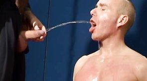 Passionate punk is swallowing urine of his boss