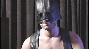 Leather-clad onlooker watches a crazy sex session