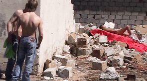 Three gay dudes fucking among the ruins