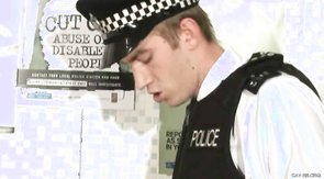 Young blonde guy gives a blowjob to a policeman