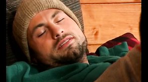 Bearded stud in a sweater gets a nice blowjob