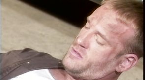 Bald-headed dude makes them share a double-sided dildo