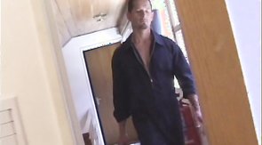 Dark-haired dude stroking his massive cock