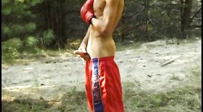 Big-dicked boxer dude gets a blowjob from his BF