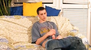 Grey t-shirt brunette twink stroking his meaty cock