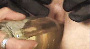 Biker dude torturing his two hung slaves on cam