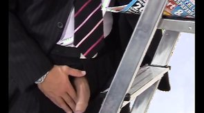 Fully dressed businessmen gets a double facial