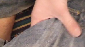 Two sensual boyfriends making out on a couch