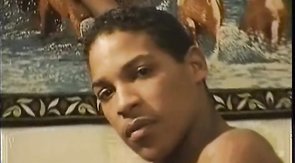 Latino hunk masturbating on a fancy chair