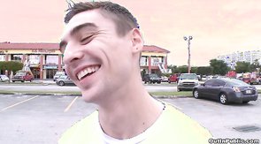 Bodybuilder sucking this jock's hard wiener at the parking