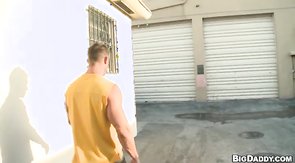 Two hunks sucking dicks in the garage on the camera