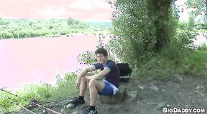 Very muscular male is fucking this cute guy in his face