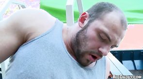 Bearded fucker getting his anal stretched outdoors