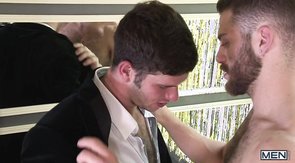 Sharply dress twink sucking his hunk's big cock