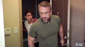 Dark-haired twink gets a blowjob from an older guy