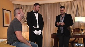 Bellboy gets blown by a big-dicked dude in a hotel room