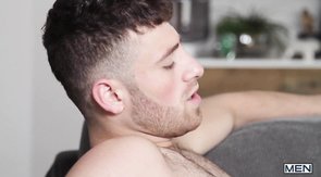 Intense face and ass fucking session on a grey couch