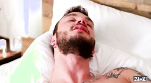 Bearded dude gets face-fucked on a big white bed