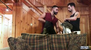 Lumberjack-y looking hung stud sucking his BF's cock