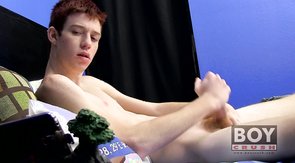 Redhead with a pasty body shoves a big toy up his a-hole