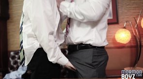 Bald-headed Mormon stud sucking cock on his knees