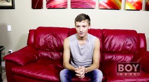 Horny twink in a tank-top stripping and masturbating